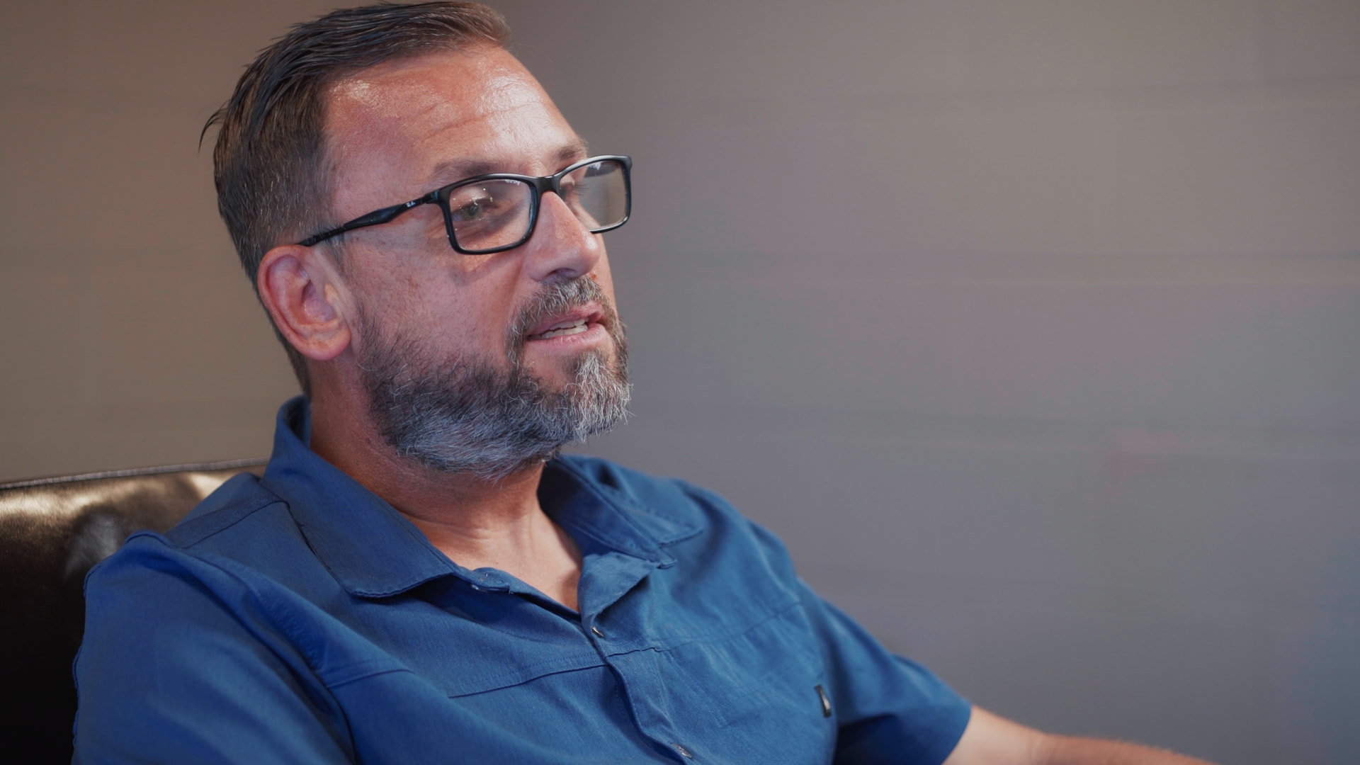 Interview subject in blue shirt